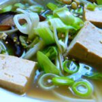 Savor Vegan Pho: Tofu & Edamame Delight in a Bowl